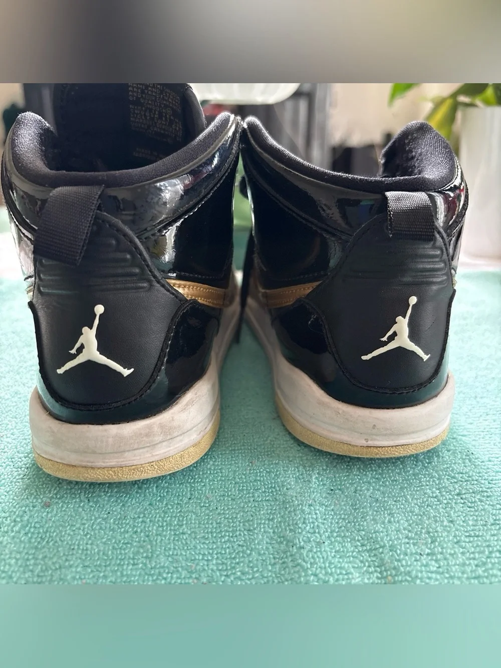 Nike Kids' High-Top Sneaker - Black with Gold Swoosh